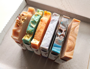 Tops of colourful soaps in gift box