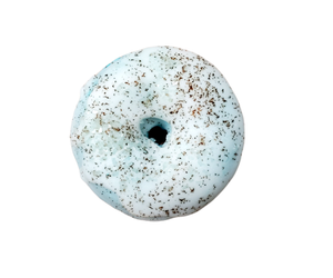 Rootbeer mini donut bath bomb with cocoa butter icing and vanilla bean specks