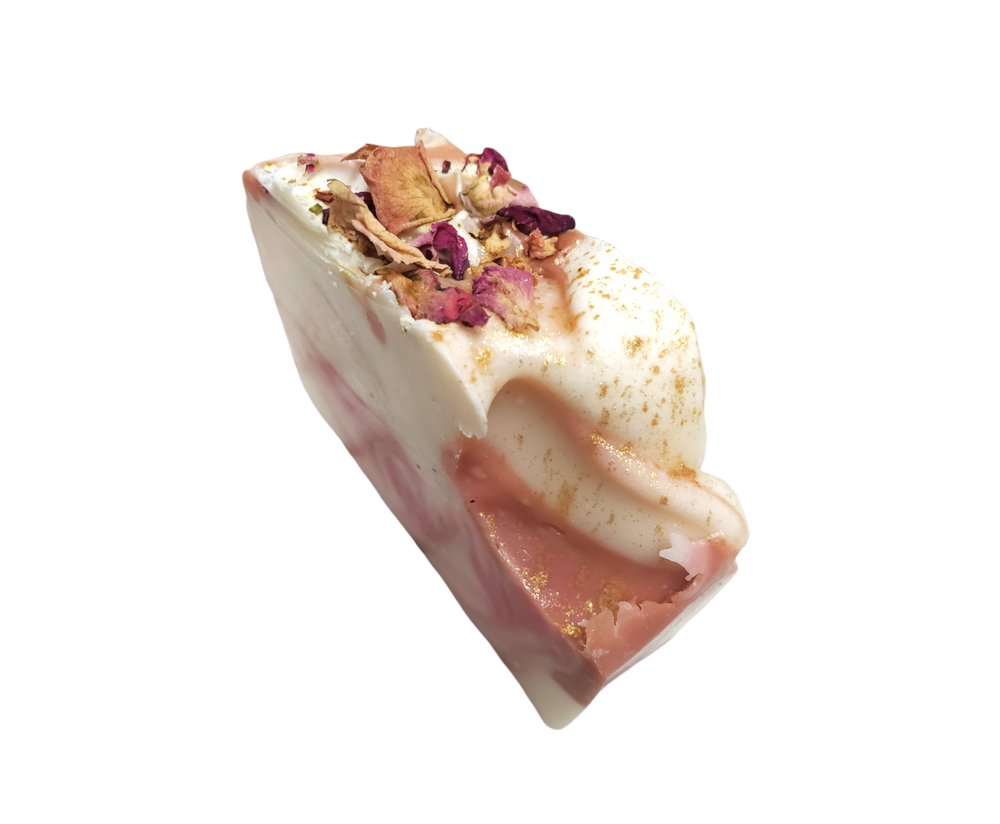 Rose petals and gold sparkles on pink and red valentine's day soap