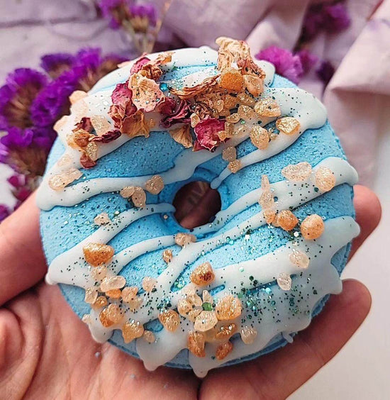 Blue bath bomb with roses and sea salt