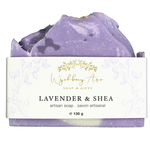 
                
                    Load image into Gallery viewer, purple lavender bar soap with lavender buds on top and a delicate floral label.
                
            