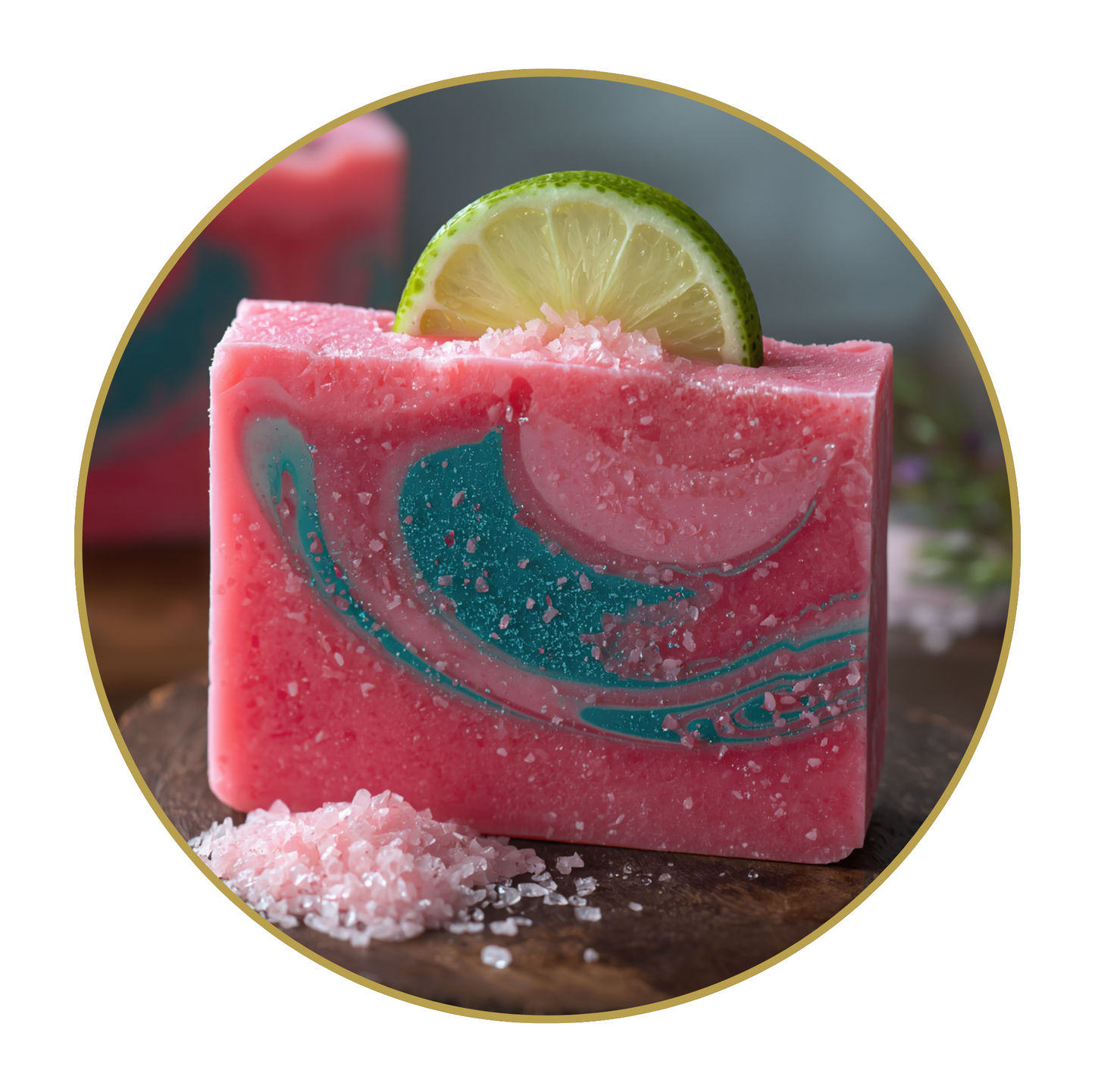 Pink and green soap bar with a lime wedge on a wooden surface