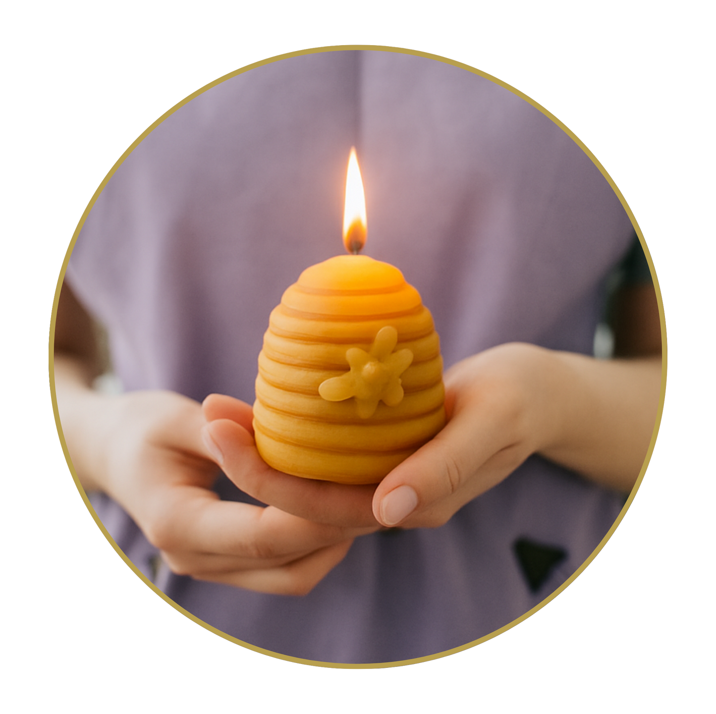 Hand holding a beehive-shaped candle with a flame against a blurred background