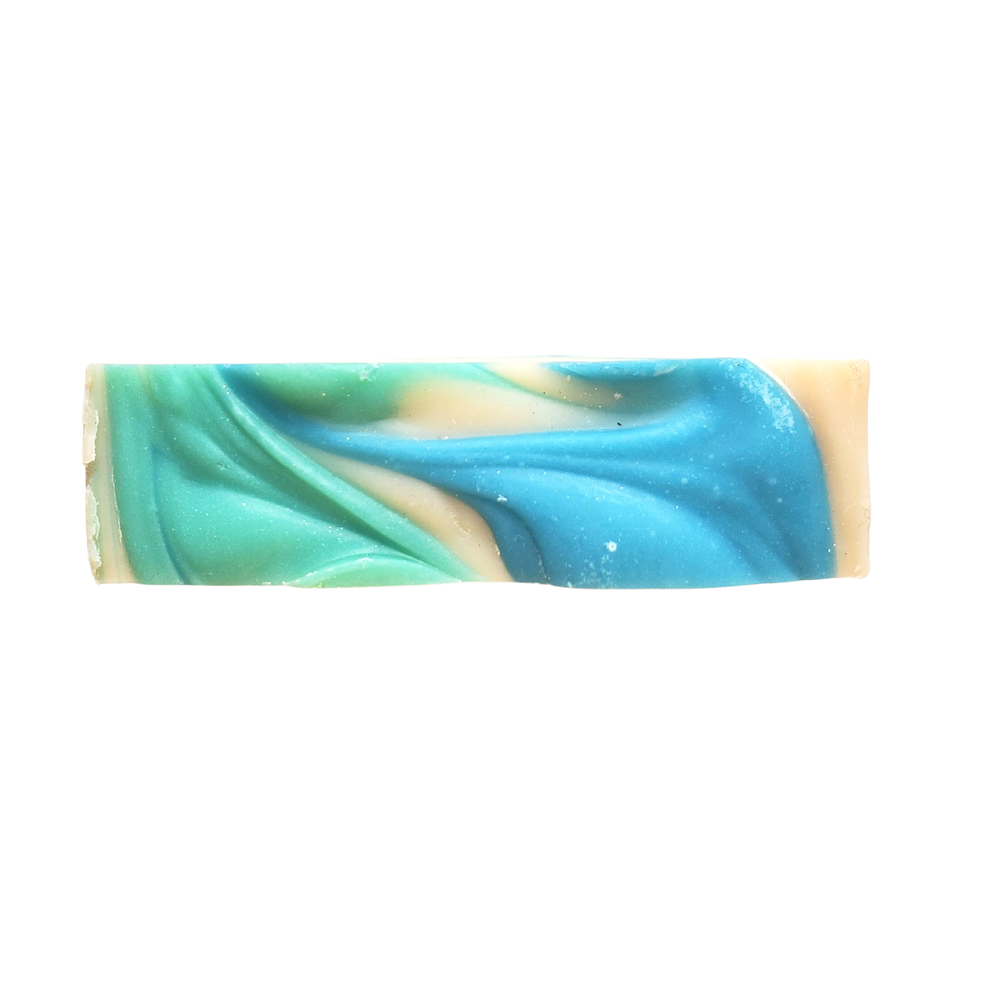 top of creamy bar soap with blue and green swirls
