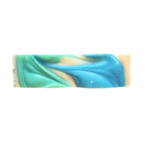 top of creamy bar soap with blue and green swirls