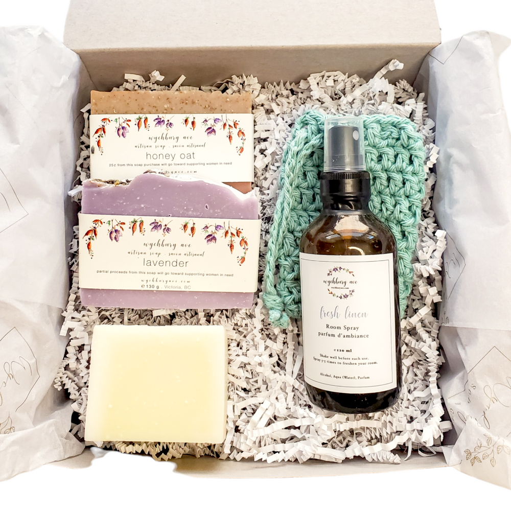 Housewarming gift box with handmade soap, room spray, solid dish soap, and cotton wash cloth