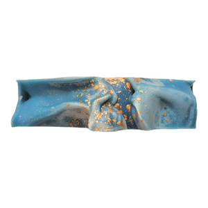 Wavy top of Simply the best bar soap with gold mica dust